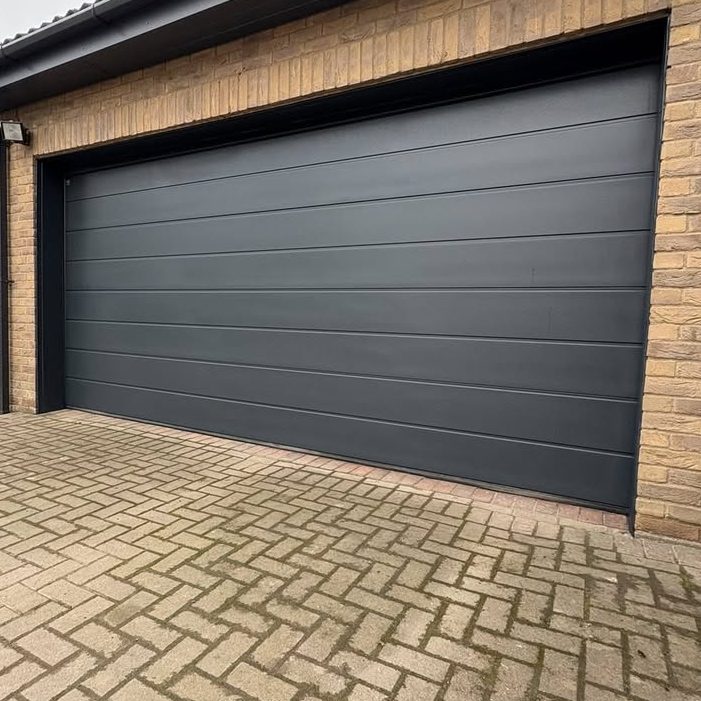 Commercial garage door spray painting 